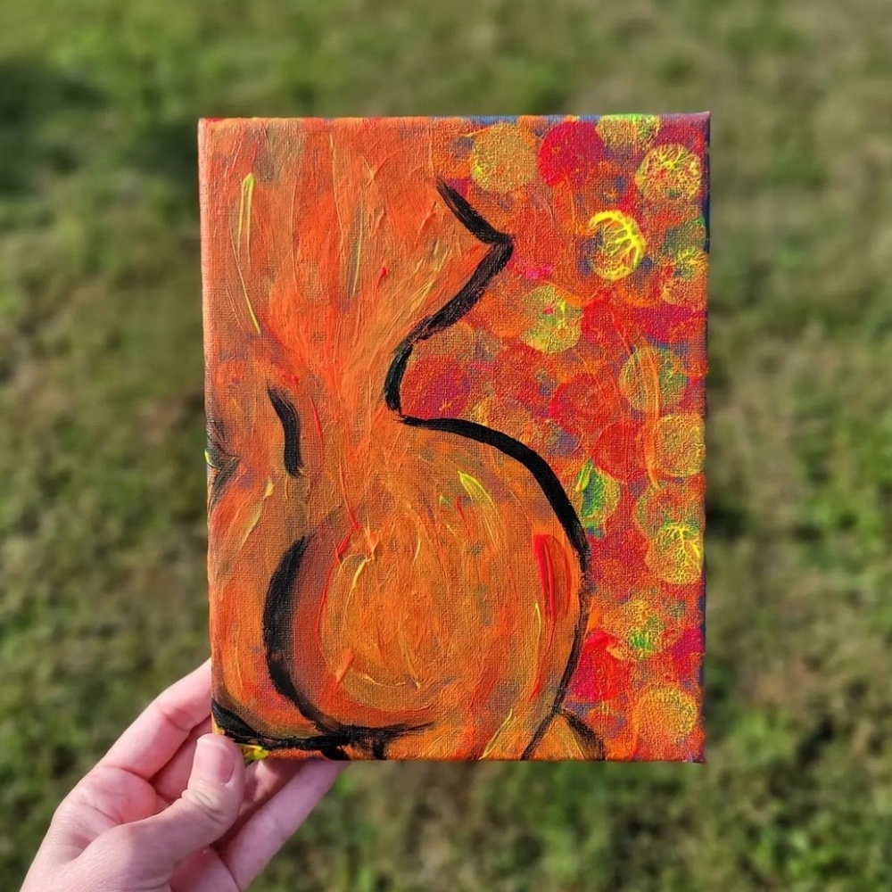 colorful curvy woman painting